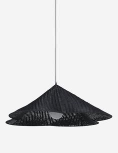 a black lamp hanging from the ceiling