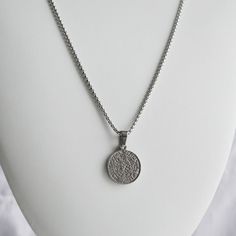 This stainless steel coin pendant necklace is an excellent choice for a trendy yet sophisticated look that won't tarnish or rust, even when worn in the water. 💎Free shipping on all orders💎Waterproof and non-tarnish💎Packaging that is ready to offer as a gift💎Customizable chain length💎Best Seller on Etsy A coin pendant necklace, a great gift idea for men This stylish coin pendant necklace is a popular choice for gifting to boyfriends, fathers, cousins, best friends, or any other important per Nickel-free Stainless Steel Chain Necklace With Round Pendant, Round Metal Medallion Necklace, Tarnish Resistant, Round Metal Medallion Necklace Tarnish Resistant, Medallion Coin Necklace In Metal As Gift, Stainless Steel Jewelry With Coin Pendant, Silver Tarnish Resistant Coin Medallion Necklace, Medallion Necklace With Box Chain As Gift, Silver Tarnish-resistant Coin Medallion Necklace, Gift Stainless Steel Necklace With Coin Pendant