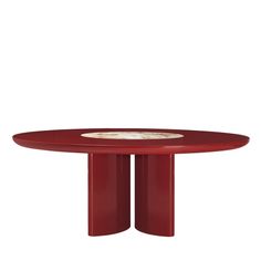 a red table with two white plates on it's pedestals and the top is round