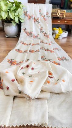 Adorn this elegant semi tussur soft silk saree for any summer occasion with a unique touch of cutwork border and beautifully designed multicolored thread work. A soft smooth texture in off white body with a garden of beautiful flowers 🌼🌹 woven in Reshom threads, making it simply unique elegant looking with a classy touch in a very budget friendly manner. Saree is paired with same color and same textured Blouse piece with another floral design. Saree is ready to dispatch for your any urgent occasion needs. Dry cleaning recommend only. Due to digital photography color variation is considerable. Bridal Anklet, Textured Blouse, Design Saree, Designer Blouse, Soft Silk Sarees, Thread Work, Cut Work, Smooth Texture, Blouse Piece