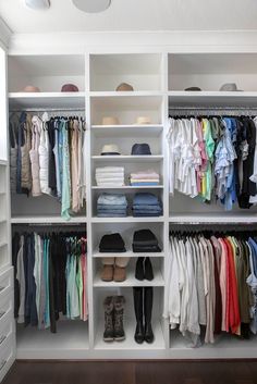 an organized closet with clothes and shoes