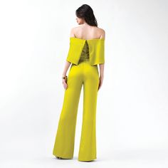 This Jumpsuit features a chic bow detail that adds a touch of femininity and elegance to its design. The bow accent elevates the sleek silhouette, creating a playful yet sophisticated look. Ideal for both formal events and stylish outings, this jumpsuit blends modern style with a classic, graceful touch 67% cotton 33% polyester dry clean only Elegant Yellow Long Sleeve Jumpsuit/romper, Stocking Fillers For Her, Jewelry Ring Box, Mens Jewelry Bracelet, Jacket Sale, Independent Designers Fashion, Formal Event, Bridal Collection, Playsuit Jumpsuit