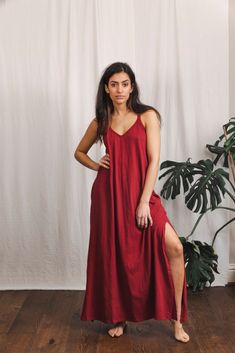 ~Bamboo maxi dress in red~ ~ Size uk 8-14 ~ ~Open slits on each side ~ ~Pockets~ ~Hand done block print on the reverse ~ 🙏 Caring 🙏 Raw Cottons, Linens and Earth Friendly fabrics  are best washed by hand or cold cycle with an ecological detergent . *FIND US * You can find us on other platforms for more photos, updates  and for sharing our journey... Instagram----- @Inka.Free Facebook----  https://www.facebook.com/INKA.FREE Red Maxi Dress With Side Slits For Summer, Red Maxi Dress For Vacation, Casual Red Long Maxi Dress, Red Maxi Dress With Side Slits, Bohemian Floor-length Maxi Dress With Side Slits, Red Sleeveless Maxi Dress With Side Slits, Flowy Red Cotton Maxi Dress, Flowy Red Bohemian Kaftan, Red Bohemian Linen Dress