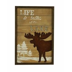 a wooden sign that says life is better at the cottage with an image of a deer