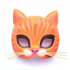 an orange cat mask on a white background