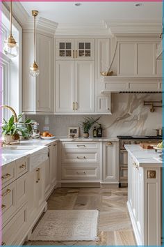 a large kitchen with white cabinets and marble counter tops, along with an area rug on the floor