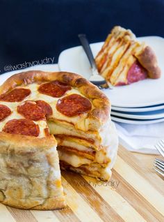 the pizza is cut in half and ready to be served on the table for consumption