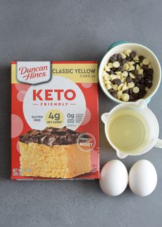 ingredients to make a cake including eggs, milk, and other items on a table