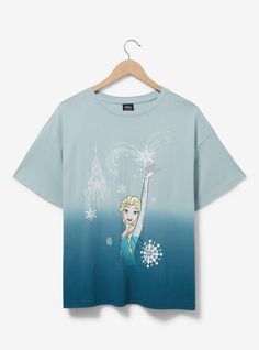 Bring the ice queen to your wardrobe with this Frozen-inspired tee! Featuring a portrait of Elsa surrounded by glittery snowflakes and her castle  this shirt includes a split dye design and a boxy fit  perfect for your next trip to the Disney Parks and beyond!Please note: due to the nature of tie-dye  wash may vary.A BoxLunch Exclusive!Organic cottonListed in women's sizes; unisex silhouetteWash cold with like colors; dry lowDo not iron over printImported Disney Frozen Gift, Frozen Gifts, Disney Inspiration, Split Dye, Flat Sketches, Frozen Inspired, Movie Tees, Disney Tees, Disney Frozen Elsa