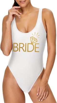 Dress to impress on your bachelorette getaway with our luxurious Bride Bachelorette One Piece Swimsuit. This elegant suit is perfect for a sophisticated and exclusive vibe. Its high quality design will make you feel like a work of art. Fabric Contents: 80% Nylon 20% Spandex White One Piece Swimsuit, Elegant Suit, Bride Bachelorette, White One Piece, Art Fabric, Winter Knit Hats, Boot Accessories, High Quality Design, Winter Knits