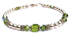 14K Gold Filled Dark Peridot August Birthstone Beaded Bracelets. Not Gold Plated - Not Gold Tone - Not Gold Finished - Genuine 14k Gold Filled The richness of genuine 14k gold, the sparkle of genuine Swarovski Crystals! You'll love this simple, classic August Olivine Dark Peridot Birthstone Bracelet - stack-able, well made, and trendy! Gold August Birthstone Bracelet showcases Swarovski Crystals in sparkling simulated Green Olivine Dark Peridot Crystals - the traditional birthstone for the month Cheap Green Beaded Bracelets For Birthday, Gold Birthstone Bracelet, Bracelets Green, Black Pearl Bracelet, Black Tourmaline Bracelet, Peridot Birthstone, Green Beaded Bracelets, Peridot Bracelet, Black Onyx Bracelet