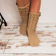 A beautiful pair of crochet women's boot/slippers. Made of wool yarn they are so soft, warm, cozy to wear and have a lot of bulk for extra comfort. Soles are covered with latex, which makes them not slippery to walk and give it a long life. You can also choose double sole - crochet + felted moisture retaining non-slip sole. If you want to have double sole, add this felted sole from the link together with selected slippers: https://www.etsy.com/listing/883778891/waterproof-felted-non-slip-sole-fo Cozy Knitted Slippers With Round Toe, Hand Knitted Round Toe Slippers For Winter, Cozy Knitted Booties With Round Toe, Hand Knitted Round Toe Winter Slippers, Hand-knitted Round Toe Winter Slippers, Cozy Hand Knitted Slippers With Round Toe, Cozy Hand-knitted Slippers With Round Toe, Cozy Hand-knitted Round Toe Slippers, Cozy Handmade Winter Slippers