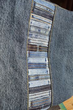 the inside of a pair of jeans with some patches on it