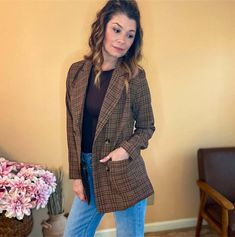 This Preptastic Plaid Blazer will make a timeless addition to your wardrobe. Its rustic design features a V neckline with collar, long sleeves, double button front closure and functional pockets. Crafted from a poly-cotton blend, it's fully lined for optimal comfort. Available in brown with pink accents. V neckline with collar Long sleeves Double button front closure Functional pockets Fully lined Material: Poly-cotton blend Color: Brown with pink Plaid Blazer With Double Button Closure And Long Sleeves, Fall Casual Double-breasted Blazer, Brown Double-breasted Blazer For Fall, Trendy Long Sleeve Double-breasted Blazer, Trendy Cotton Blazer For Fall, Fall Cotton Button-up Blazer, Plaid Cotton Blazer For Fall, Cotton Button-up Fall Blazer, Plaid Blazer With Pockets