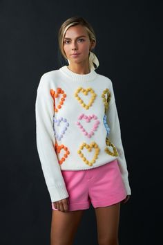 This Multicolor Heart Pom Sweater is a perfect addition to your wardrobe! Crafted with luxurious knit fabric it features a round neck ribbing and the standout feature - a heart pom detail. This stylish and unique sweater is sure to add some texture to your wardrobe. Stay warm and fashionable this winter with our Multicolor Heart Pom Sweater. It's sure to be the perfect piece for any occasion. Knit Heart pom detail Round neck Ribbing Multi color Relaxed fit Regular length Hand Wash Cold Do Not Bl Ivy Clothing, Knit Heart, Unique Sweater, Summer Style Guide, Knitted Heart, Unique Sweaters, Casual Party Dresses, Knit Outerwear, Fashion Night