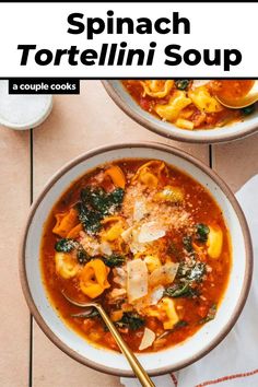 two bowls filled with tortelli soup on top of a table