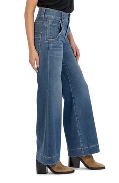 Make a casual-chic statement in these faded jeans featuring wide legs and low-stretch denim. 30 1/2" inseam; 23" leg opening; 11" front rise: 15" back rise (size 8) 85% cotton, 14% polyester, 1% spandex Machine wash, tumble dry Imported Distressed Wide Leg Flare Jeans In Medium Wash, Chic Mid-rise Faded Flare Jeans, Fall Medium Wash Wide-leg Flare Jeans, Chic Wide Leg Faded Jeans, Chic Wide Leg Faded Bottoms, Chic Faded Wide Leg Bottoms, Wide Leg Flare Jeans In Medium Wash, Faded Wide Leg Flare Jeans, Medium Wash Wide Leg Pants For Fall