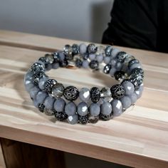 Beautiful Bracelet Features Faceted Grey Beads, Gunmetal Filigree Beads, Faceted Clear Smoke Beads, And Gunmetal Rhinestone Beads In A Wrap Style That Fits Most Size Wrists. Details: One Size Nwt Artisan Designed And Handcrafted. Please See Photos For Additional Details. Product Color May Differ Slightly From Photos Due To Differences In Color Monitors And Lighting. Smoke Free Studio. Will Be Packaged And Shipped With Care. Bundle Your Favorites For A Great Discount! Grey Beaded Bracelet, Gunmetal Jewelry, Grey Jewelry, Diy Earrings Easy, Nugget Bracelet, Beautiful Beaded Bracelet, Boho Wrap Bracelet, Gray Jewelry, Grey Beads