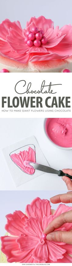 a cake with pink icing and flowers on it, next to a hand holding a knife