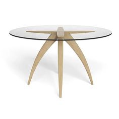 an oval glass table with wooden legs