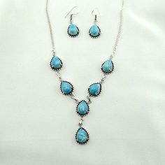 "Beautiful sterling silver and blue Larimar necklace and earring set. Marked 925 A wonderful addition your personal jewelry collection. FREE SHIPPING! Details: Sterling Silver: (as shown in picture) Larimar: Cabochons Approximate Earring Dimensions: 3/4 inch (plus a 1/2 inch drop) x 5/8 inch Approximate Necklace Dimensions: 18 inches with a 2 inch drop pendant Total Weight (set): 34.0 grams FREE domestic shipping by USPS Priority Mail Signature Confirmation and includes insurance. If the item is Elegant Turquoise Larimar Jewelry, Hypoallergenic Turquoise Jewelry For Anniversary, Turquoise Larimar Cabochon Jewelry, Blue Teardrop Cabochon Jewelry, Turquoise Teardrop Sterling Silver Jewelry, Nickel-free Turquoise Jewelry For Anniversary, Blue Larimar Dangle Jewelry, Blue Larimar Teardrop Jewelry, Handmade Blue Larimar Jewelry