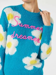 Woman brushed and ultra soft sweaterDaisies on light blue backgroundSummer dreamer lettering on the frontRegular fitCrewneckSaint Barth logo on the sleeveRibbed collar bottom and cuffsComposition: 20%Alpaca - 35% Polyamide - 45% Acrylic Summer Crew Neck Sweater With Floral Print, Summer Floral Print Crew Neck Sweater, Spring Blue Graphic Print Sweater, Blue Graphic Print Spring Sweater, Blue Graphic Print Sweater For Spring, Blue Tops With Embroidered Text For Spring, Trendy Summer Sweater With Floral Print, Trendy Summer Floral Print Sweater, Trendy Floral Print Summer Sweater