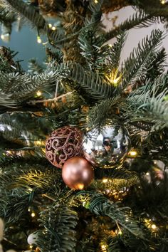 a christmas tree with ornaments hanging from it