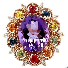 4.98 Carat Oval Cut Amethyst Diamond Sapphire Rose Gold Cocktail Ring This beautiful vintage inspired setting with a modern colorful theme has an Oval Cut Amethyst weighing 3.93 carats and is surrounded by 10 Round Cut Multi-Colored Sapphires that weigh 0.94 carats and 10 Round Cut Diamonds weighing 0.11 carats. The total carat weight of the ring is 4.98 Carats. The Amethyst measures at approximately 9 mm x 11 mm and the face of the ring measures approximately at 18 mm x 23 mm.  The ring is made Rose Gold Cocktail, Colored Sapphires, Gold Cocktail Ring, Gold Cocktail, La Face, Cocktail Ring, Round Cut Diamond, Cocktail Rings, Free Jewelry