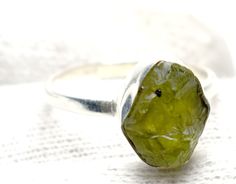 Read the full title Raw Peridot Ring, Natural Peridot Rough Ring, Ring for Women, Healing Crystal Raw Ring, Peridot Birthstone Ring, Promise Ring, Boho Ring 925 Sterling silver Natural Peridot Ring, Handmade Green stone Ring, Fine silver Ring, Product:- Ring Modal no:- SR 91-94-100 Metal:- 925 Sterling Silver Gemstone :- Peridot Stone Shape: Fancy Shape Gemstone size:- 8 mm Mini to 10 mm mix We are using Pure 925 (Stamped) Sterling Silver with Natural Gemstone Jewelry, all of our jewelry designs Peridot Birthstone Ring, Rough Ring, Raw Ring, Raw Peridot, Women Healing, Peridot Birthstone, Handmade Jewelry Ring, Green Stone Rings, Peridot Stone