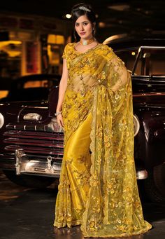 Mustard silk festival wear saree 6010  Desc:  Color : Mustard Fabric : Silk Wash Care : Dry clean Sleeve Style : Short Sleeve Long Sleeves : Done only in Custom Stitch Sleeves Lining : Done only in Custom Stitch Bust Size : 32 to 42 Inches Occasion : Festival   Kitty Party   Sangeet   Party Wear   Engagement   Reception   Ceremonial. With Express Free Shipping and Custom Stitching, Buy Indian Wedding Party Wear Saree Mustard silk festival wear saree 6010 online in USA, UK and Canada from KollyBo Latest Sari Designer Sarees, Heavy Work Saree, Latest Sarees Online, Blue Silk Saree, Indian Sarees Online, Heavy Work, Yellow Saree, Embroidered Saree, Designer Sarees Online