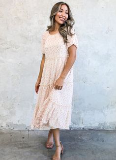 Serena modest midi dress in pink watercolor-NEW – JanieLanie Flowy Tiered Casual Midi Dress, Flowy Tiered Midi Dress Casual, Flowy Tiered Midi Dress Casual Style, Modest Flowy Tiered Summer Dress, Flowy Modest Tiered Summer Dress, Modest Flowy Tiered Dress For Summer, Modest Midi Dress With Ruffle Hem For Brunch, Modest Tiered Summer Dress, Modest Flowy Tiered Dress For Spring