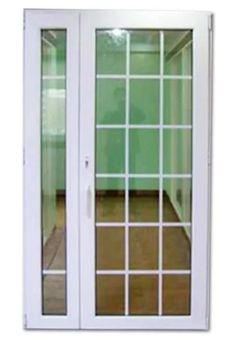 an open sliding glass door with wood flooring and green wall in the back ground