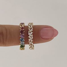 Details: This gorgeous eternity band in 14k gold features rainbow heart-shaped stones all the way around. It is delicate and has the most gorgeous inside detail, alternating up and down hearts as a symbol of eternal love! It’s perfect for stacking with your favorite rings or even as an addition to any wedding ring stack. Size: 3x3mm each (approx) Stones: Amethyst, Garnet, Pink Tourmaline, Lemon Citrine, Citrine, Tsavorite, Swiss Blue Topaz, and London Blue Topaz Available in 14k yellow, white, a Wedding Ring Stack, Heart Eternity Ring, Pink Gold Rings, Gorgeous Rings, Rainbow Rings, Love Shape, Rainbow Bracelet, Ring Stack, Matching Bracelet