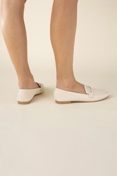 Put your feet up in style with the Harriet Loafers. These classic casual flats offer a comfortable and trendy alternative to heels. With a playful, relaxed tone, these simple yet chic flats are perfect for any casual occasion. Loafers fit true to size Elegant Everyday Slip-ons With Flat Heel, Spring Workwear Slip-on Moccasins, Beige Slip-on Ballet Flats For Work, Pointed Toe Flats For Office In Spring, Spring Pointed Toe Flats For Office, Casual Ballet Flats With Flat Heel For Work, Casual Almond Toe Ballet Flats For Work, Casual Ballet Flats For Workwear, Beige Low Heel Loafers For Spring