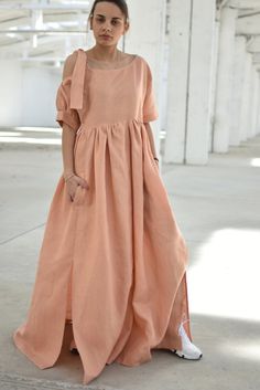 "Peach Linen Dress, Boho Linen Dress, Linen Kaftan Dress ◈ Stylish and chic fashion is our shared dream! You can be sure that this piece is made with a lot of love and craftsmanship. ◈ S I Z I N G ◈ The model wears size S and the length of the item is approximately 135 cm. This item is available from XS to 4XL. Please, have a look at my Size Chart below before placing your order. ◈ D E L I V E R Y ◈ This item will be shipped in up to 5 days after your order was placed. We use Express worldwide s Orange Maxi Length Dress For Wedding, Orange Maxi Dress For Wedding, Orange Maxi Length Wedding Dress, Fitted Tunic Dress For Wedding, Flowy Peach Maxi Dress For Wedding, Orange Summer Wedding Dress, Bohemian Tunic Wedding Dress, Flowy Peach Dress For Wedding, Peach Maxi Length Bridesmaid Dress