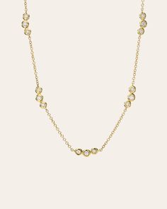 14k solid yellow gold necklace with 15 bezel diamonds hanging around the neck line. Uber chic and dainty, wear it by itself or layered. Comes with a 14''-16'' adjustable chain. Diamond Carat Weight: Approx. 0.19 ctw Size of Bezel Segments: Approx. 9mm each Diamond Quality: VS Total Weight: Approx. 2 grams Ships in 4-7 business day Rush orders ship in 2-5 business days Simple Necklace Everyday, Diamond Charm Necklace, Monogram Necklace Gold, Thick Hoop Earrings, Custom Jewelry Box, Dainty Diamond Necklace, Chain Diamond, Gold Letter Necklace, Bezel Necklace