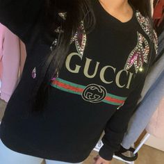 Beautiful Rare Gucci Sweatshirt Color Of Rhinestones Are Beautiful And Vibrant On It. Sweatshirt Is In Good Condition With No Missing Stones Tears Or Stains. Size Is An Xxs But Fits Loose So Someone Of A Bigger Size Can Still Wear. Please Ask Any Questions You May Have Thank You. Rhinestone Sweatshirt, Gucci Sweatshirt, Cute Shirt Designs, Big Size, Gucci Black, Black Rhinestone, Cute Shirts, Sweaters For Women, Shirt Designs