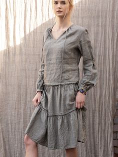 "Linen skirt with delicate, decorative wild edge on the frills. Relaxed fit with mid waist. Gorgeous, elegant and natural. The simple cut, perfect for any figure. Pair with our linen tops. French seems DETAILS: - 100% washed, softened, light linen. - Includes one linen skirt - The images above show the 'narrow stripes' colour and ''navy blue\" - Wide waistband ensures comfort - Pockets on the sides - Shrinkage after the first wash up to 3% - Does not cause allergies - Has bacteriostatic properti Spring Dresses With Ruffles And Relaxed Skirt, Casual Long Dress With Ruffle Hem, Fall Long Skirt Dress With Ruffles, Fall Dresses With Ruffled Long Skirt, Bohemian Dresses With Ruffles And Relaxed Fit, Bohemian Dresses With Ruffles And Relaxed Skirt, Peasant Style Flowy Skirt With Ruffles, Spring Tiered Skirt Dress With Pockets, Spring Dresses With Pockets And Tiered Skirt