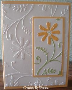 a close up of a card with flowers on it