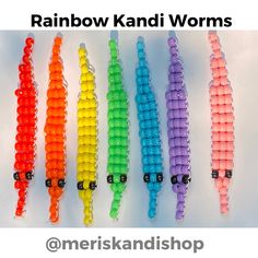 rainbow kandi worms are lined up on a white background with the words, rainbow kandi worms