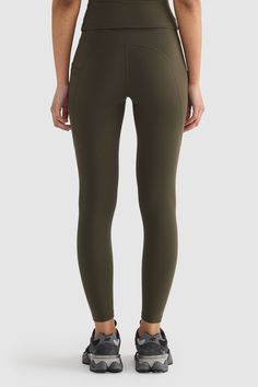 Designed to move with your body, the Eva 7/8 Leggings Dark Moss are perfect for yoga and other low impact movements. These leggings are crafted from an ultra soft double brushed fabric and feature subtle tonal branding. Ankle length legging with design seam detailing High waisted with double layered waistband Subtle tonal branded on centre back Single pocket on leg for storage Ultra soft double brushed fabric for a buttery handfeel Designed in Australia. Made in China. Ankle Length Leggings, Beach Sunglasses, Sweat Top, Sport Bra Top, Polo Sweater, Linen Shorts, Sports Leggings, Sport Shorts, Linen Shirt