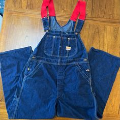 Penneys Payday Denim Bib Carpenter Overalls/Coveralls Rare, Vintage And Union Made Sanforized Preshrunk Cotton Red Accent Stitching Signature Pay Day Buttons Button Fly No Funky Smells There Is No Size Tag. Please See Photos For Measurements. Approximate Size 38w. Alterations/Flaws: The Straps Have Been Extended With Coordinating Red Elastic, Making Them Perfect For A Taller Individual And Also For Quick And Easy Dressing. Could Be Removed And Original Straps Reconnected, As They Have Not Been S Vintage Denim Blue Bib Front Overalls, Retro Dark Wash Bib Front Overalls, Retro Denim Blue Overalls With Pockets, Vintage Bib Front Medium Wash Bottoms, Vintage Medium Wash Bib Front Bottoms, Vintage Denim Blue Bib Front Jeans, Retro Blue Shortalls With Pockets, Retro Denim Blue Overalls, Denim Blue Retro Overalls