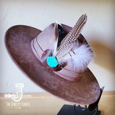 Boho Western hat with genuine leather hat band feathers and turquoise Handmade Bohemian Felt Hat With Flat Crown, Handmade Bohemian Felt Hat For Rodeo, Bohemian Adjustable Hat Band With Feathers, Bohemian Feather Hat Bands For Ranch, Bohemian Hats With Curved Brim For Ranch, Bohemian Felt Hat With Flat Crown For Ranch, Bohemian Hat Band With Feathers For Ranch, Artisan Hats With Feathers And Adjustable Fit, Bohemian Hat Bands With Feathers For Ranch