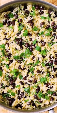 rice with black beans and cilantro in a pan