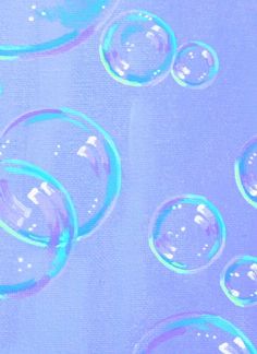 soap bubbles are floating in the air on a blue and purple background with white dots