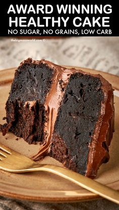 a piece of chocolate cake on a plate with a fork