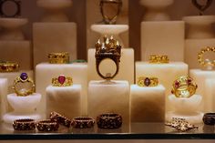 many different rings and bracelets are on display