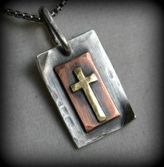 "Completely handcrafted through metalwork, in Asheville, NC. No mass production is involved. Much love and care is put into each ring. These are built to last. Materials: .999 fine silver, copper & brass Choose which chain you want at purchase. Either .925 Sterling silver chain or a stainless steel military dog tag style chain. See the last 2 photos to see the 2 different chains. The stainless steel dog tag chain comes in longer lengths and is the most durable option. .925 sterling silver ch Military Dog Tag, Rustic Wedding Bands, Rustic Cross, Military Dog, Rustic Necklace, Dog Tags Military, Cross Jesus, Hand Stamped Necklace, Handcrafted Necklace