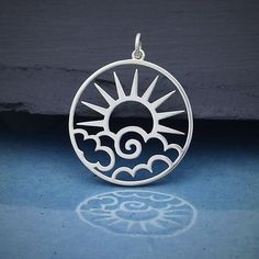 "Sterling Silver Sun and Waves Outline Charm. 925 Solid Sterling Silver Sun Charm. 30mm x 25mm (Length Includes 5mm Jump ring) Available on 16\" or 18\" solid 925 Sterling Silver delicate 1.3mm cable chain." Metal Piercing, Breaking Through The Clouds, Laser Jewelry, Snake Ring Gold, Moon Phase Jewelry, Pendant Ideas, Mushroom Jewelry, Handmade Silver Jewellery, Laser Engraved Ideas