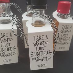 three bottles with labels on them that say take a shot, i just wanted to be married